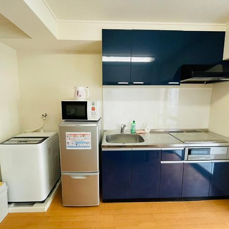 Sun Million Tenjin - Apartment Stay Фукуока Номер фото